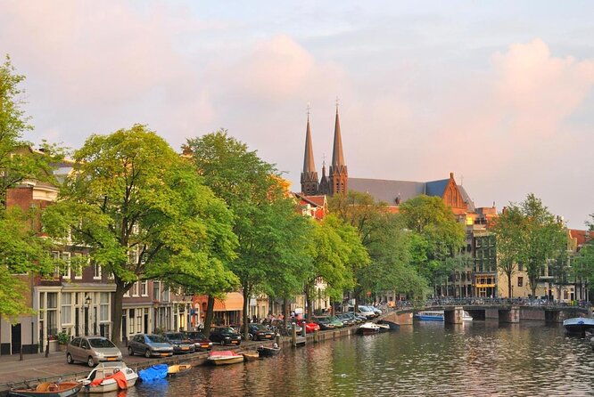 Amsterdam Luxury Canal Cruise + Unlimited Drinks & Bites option - Key moments to watch for on this Amsterdam canal hour