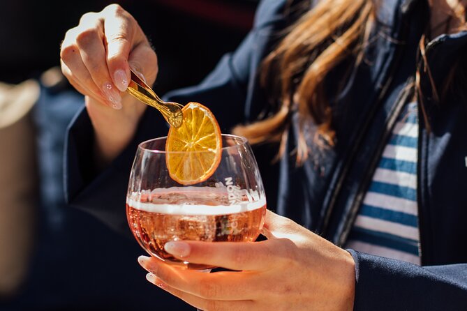 Amsterdam: Luxury Saloon Boat Cruise with Cocktails & Waffle - The guide experience: stories, laughs, and names worth remembering