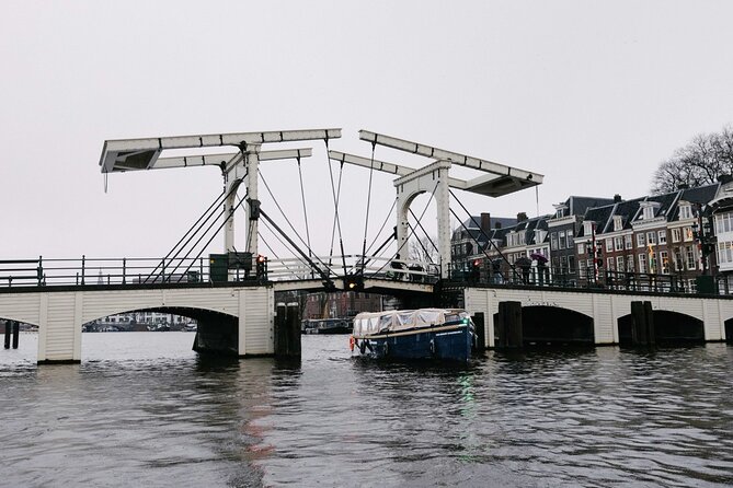 Amsterdam Newest Canal Cruise with local guide and small group - Saint Nicholas and the maritime vibe around Oude Kerk and De Wallen