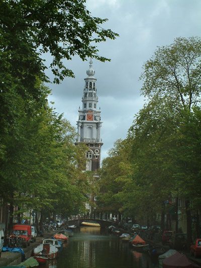 Amsterdam Old City Private Walking Tour - Medieval center walls and church stops that anchor the walk