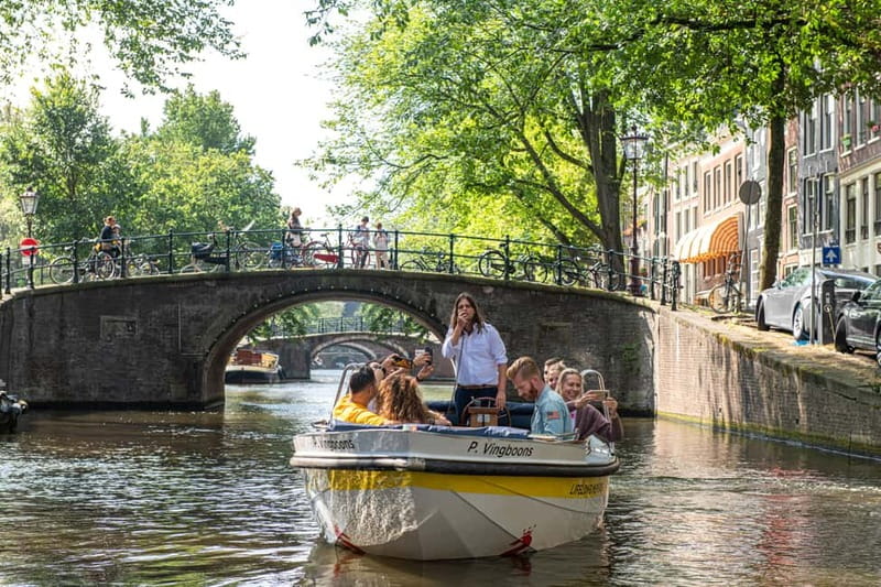 Amsterdam: Open Boat Canal Cruise (with Free Spritz Option) - Choosing your departure point: Damrak, Leidseplein, or the Rijksmuseum area