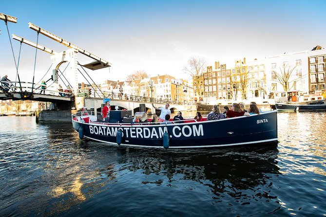 Amsterdam Open Boat Cruise in Old City Center with Live Guide - Meeting at Amstel 51F by the Hermitage Museum: Easy to Find, Easy to Anchor Your Day