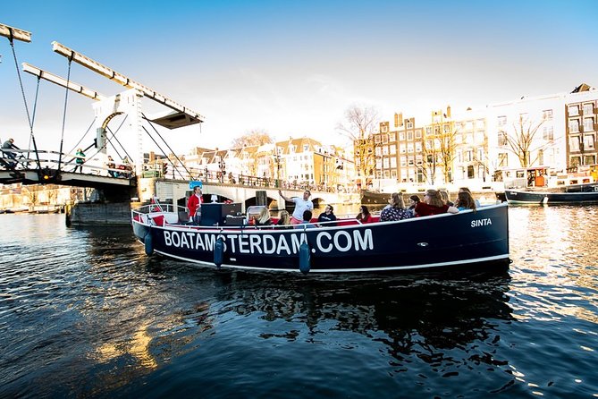Amsterdam Open Boat Cruise with Live Guide and Two Drinks - Who should book this cruise, and who should skip it