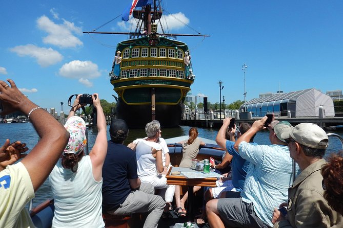 Amsterdam Open Boat Tour with Local Guide - Open Boat Reality Check: Cold Weather, Smart Casual, and Comfort
