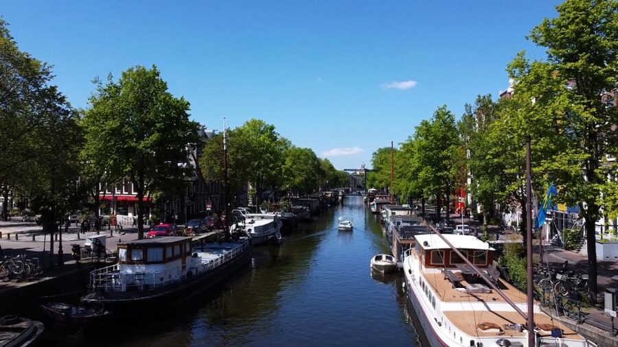 Amsterdam: Private Canal Tour - The Monet Painting Spot, Plus Old Amsterdam Stories You Can Use Later