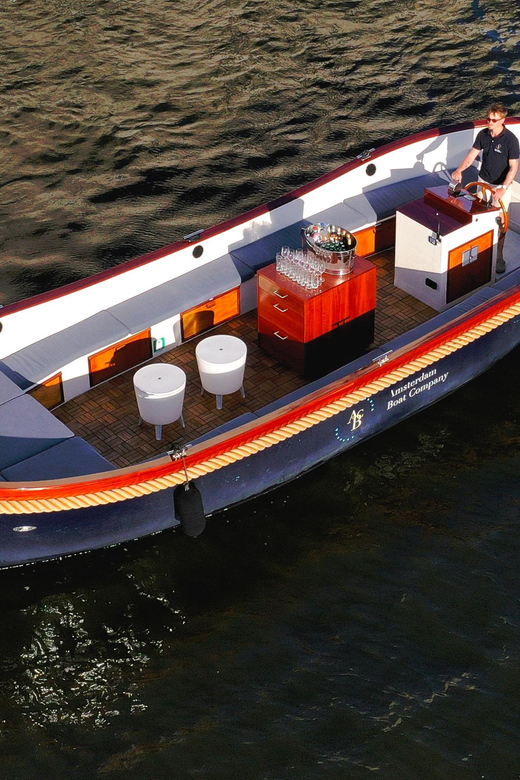 Amsterdam: Private City Canal Cruise With Unlimited Drinks - Where To Meet: Central Station, Trams, And The Blue Boat