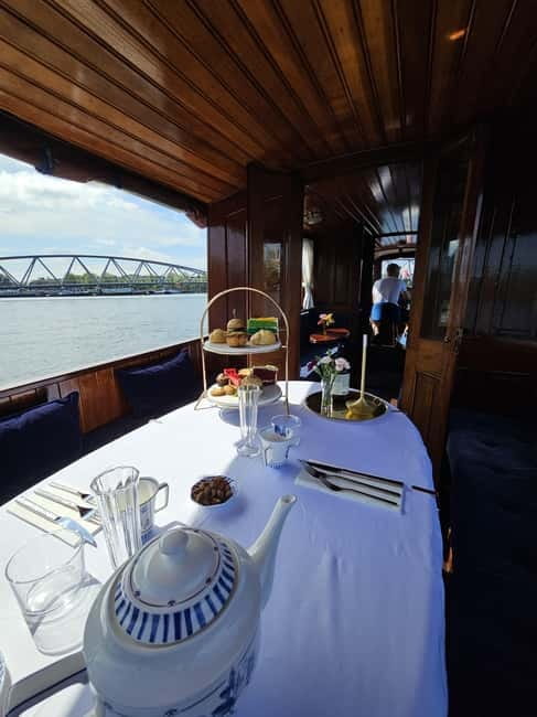 Amsterdam: Private Dinner Cruise on a Luxury Saloon Boat - Step aboard the heated saloon boats with an open area
