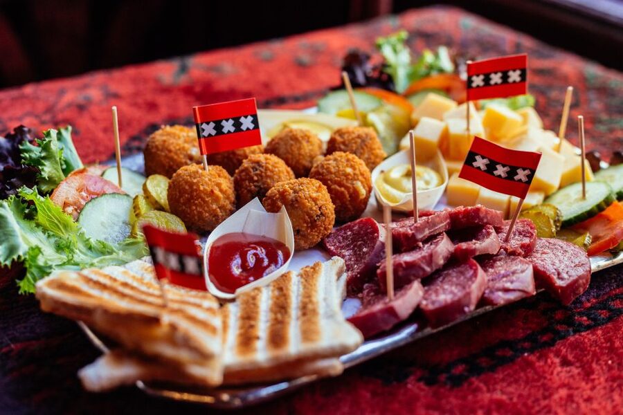 Amsterdam: Private Food Tour with a Local - The market stop that does the heavy lifting