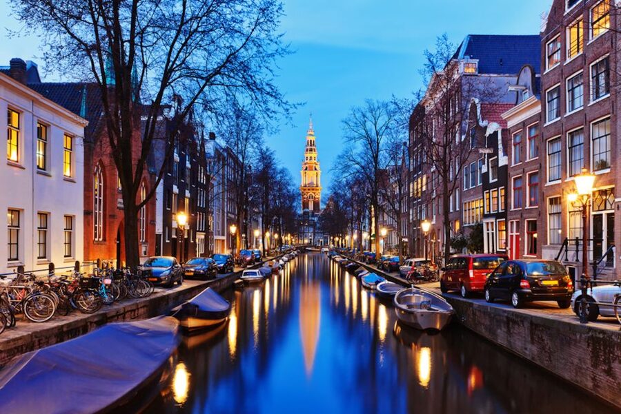 Amsterdam: Private Guided Walking Tour - Amstel origins and medieval cobblestones: the old center becomes understandable