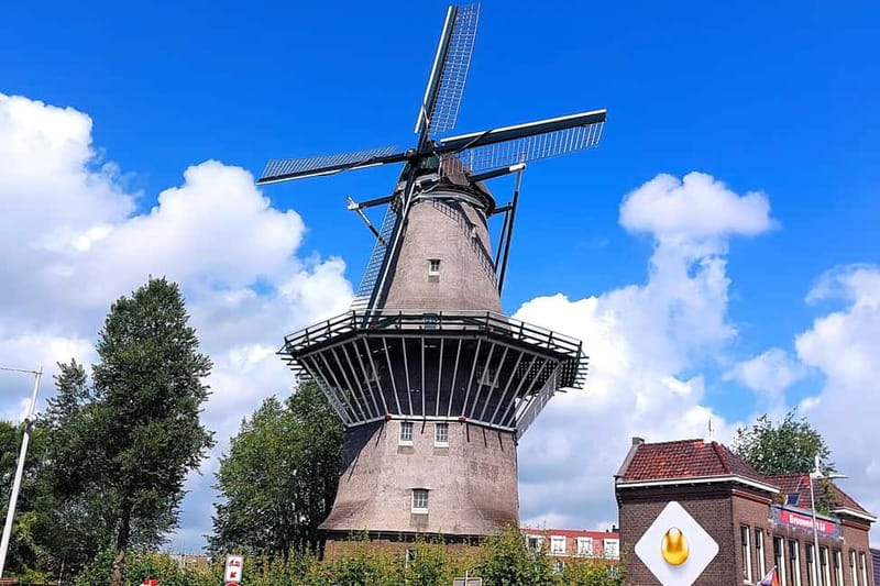 Amsterdam: Private Tour with Local Guide (French or English) - Canals, Nieuwmarkt en Lastage, and Begijnhof for a Breather