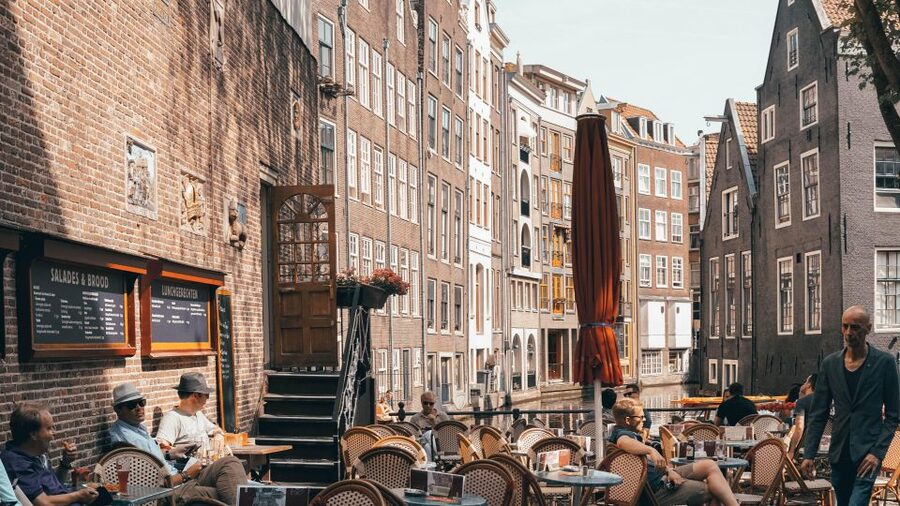 Amsterdam: Private Walking Tour from Westerpark to Jordaan - Food, pastry, and tea or soft drink, included and actually useful