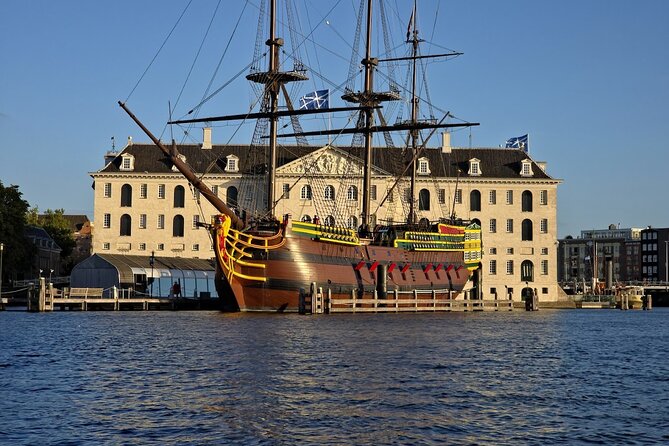 Amsterdam Private Walking Tour with Dinner Experience - Nieuwmarkt, Lastage, and the canal-belt shift to slow sightseeing