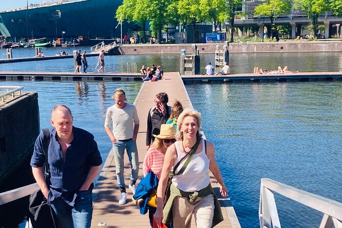 Amsterdam Private Walking Tour with Dinner Experience - Kuuma Marineterrein: VOC ship history, modern water culture, and a towel