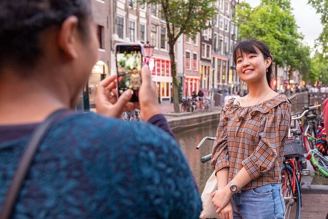 Amsterdam: Red Light District & City Tour (Private tour) - Damrak: The Best Q and A Stop on Sex Work in Amsterdam