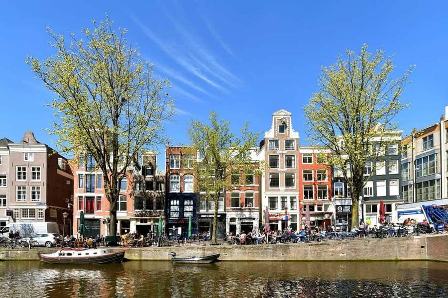Amsterdam: Red Light District Tour in English or German - Finding the first coffeeshop in Amsterdam