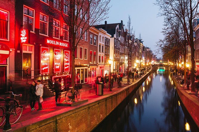 Amsterdam Red Light District Walking Tour in EN/DE/IT/ES - The optional 1970s peepshow add-on (2EUR)