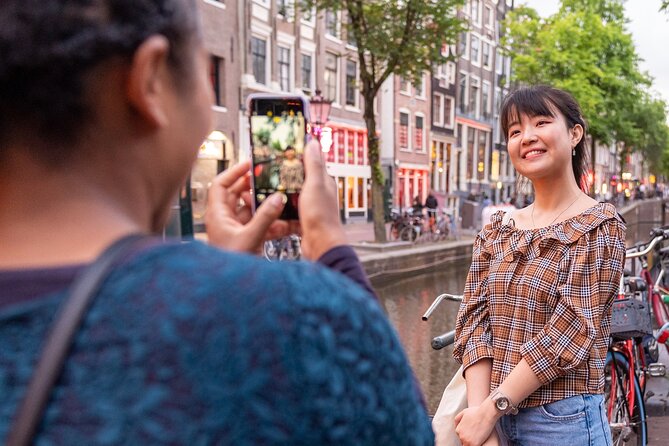 Amsterdam Red Light District Walking Tour in EN/DE/IT/ES - Condomerie: a surprising stop that adds real Amsterdam context