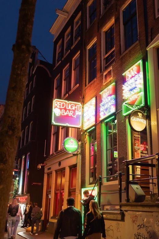 Amsterdam: Red Light Tour Exclusive + Peep Show - Why This Red Light Tour Feels Different Than the Usual Bus-Stop Stop