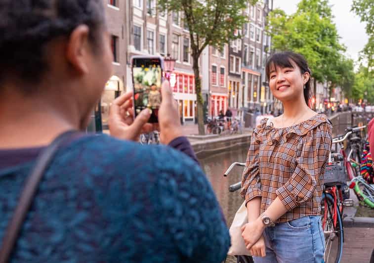 Amsterdam: Red Light Tour Exclusive + Peep Show - Condomerie and Oude Kerk: Adult Streets With Old Roots
