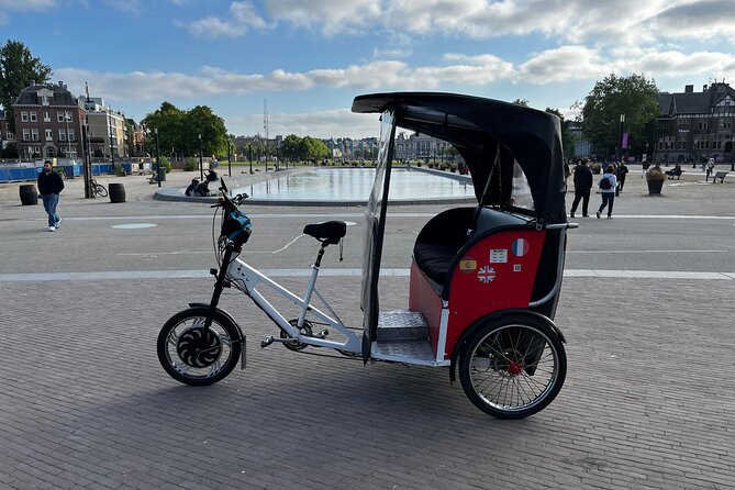 Amsterdam Rikshaw Private Tour with Guide - Dam 27 at 10:00 am: convenient, central, and easy to find
