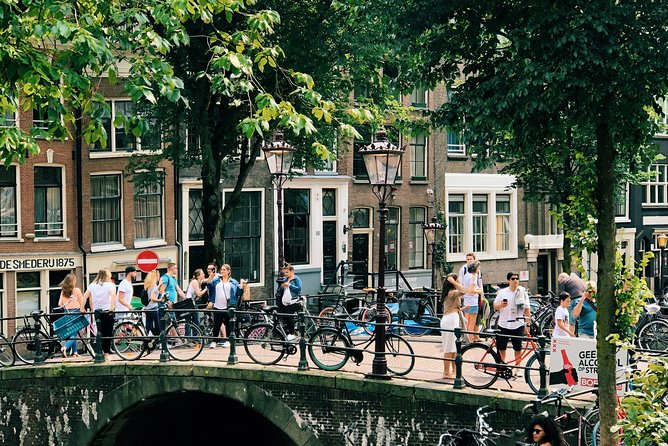 Amsterdam's Unexpected Treasures Private Walking Tour - Centraal Station to St. Nicholas Basilica: canal strolls, brown bars, and Golden Age trivia