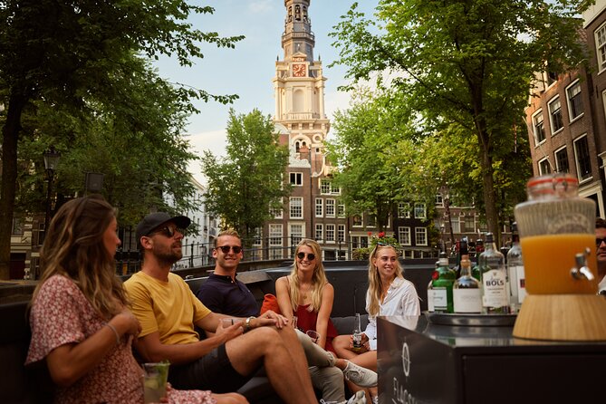 Amsterdam: Saloon Boat Cruise + Unlimited Drinks & Bite option - Your route on the water: Amstel, dams, and the logic of the city