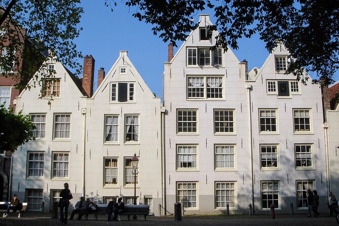 Amsterdam Sightseeing Tour + Hidden Gems + Tastings + PDF guide - The Mouse Mansion and Kalverpassage, two quirky stops with real backstories