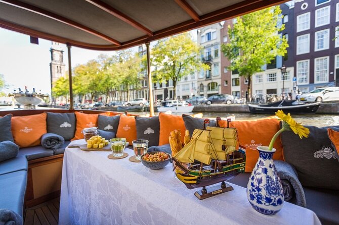 Amsterdam Small-Group Bike Tour With Canal Cruise, Drinks, Cheese - Amsterdam Centraal to De Gooyer Windmill, Then Off Into the City’s Contrasts