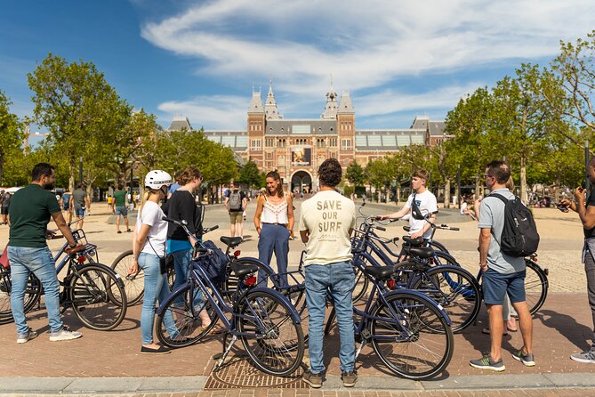 Amsterdam Small-Group Bike Tour With Canal Cruise, Drinks, Cheese - Prins Hendrik Bust Transition and Getting Ready for the Boat