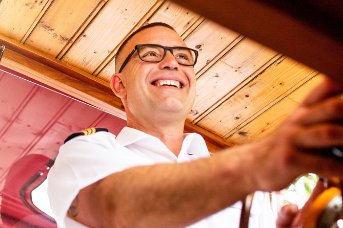Amsterdam Small-Group Canal Cruise With Dutch Snacks and Drink - Westerkerk to the Red Light District: Landmark Views Without Walking Miles