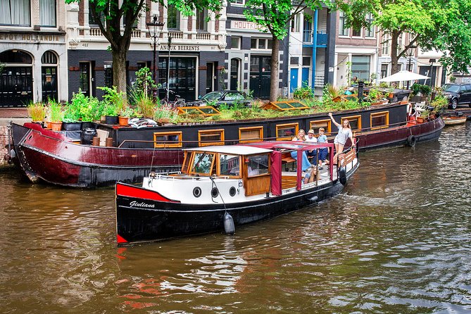 Amsterdam Small-Group Canal Cruise With Dutch Snacks and Drink - Old Streets, a Historic Flea Market, and Amsterdam’s Older Core