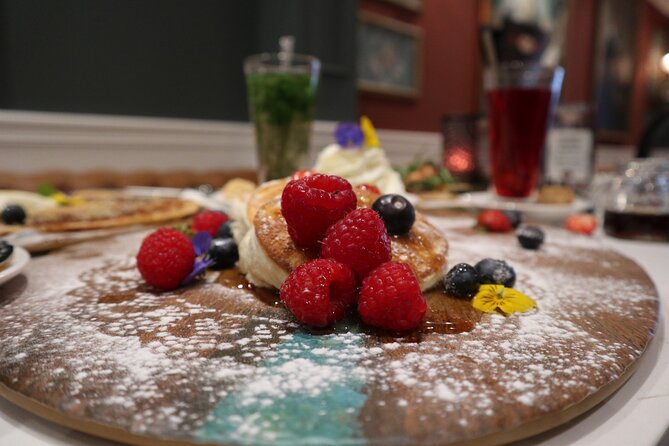 Amsterdam Small-Group Walking Tour with Typical Dutch Pancake - Dam Square: Royal Palace, a church, and the National Monument