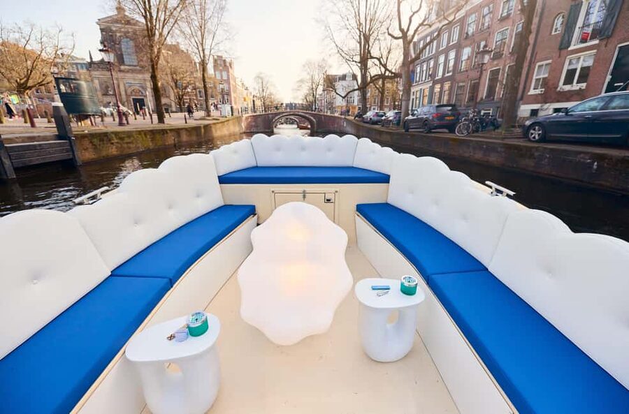 Amsterdam: Smoke & Cruise on covered Cannabis Boat With Bar - Where you meet: Oudezijds Voorburgwal 230 and first impressions