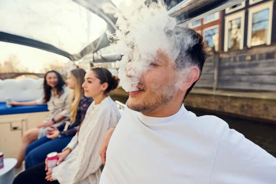 Amsterdam: Smoke & Cruise on covered Cannabis Boat With Bar - Price and value: why $27 can make sense