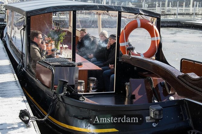 Amsterdam Smoke Friendly Cruise with drinks option & local guide - Amsterdam’s main train station from the water