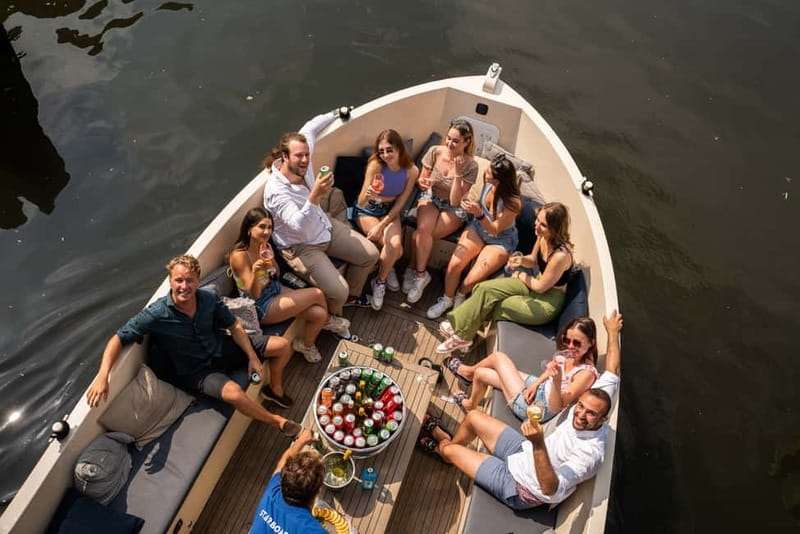 Amsterdam: Spanish Guided Open Boat Cruise with Bar Onboard - The Spanish Guide Experience, What You Get If You Speak the Language