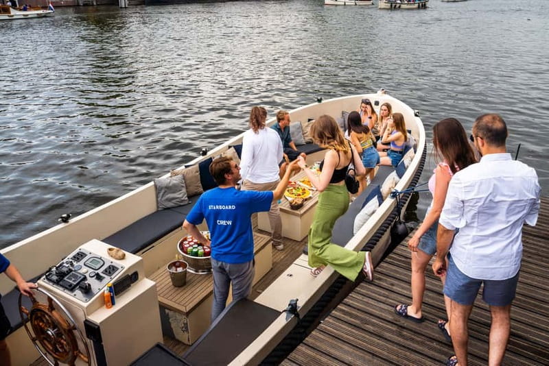 Amsterdam: Spanish Guided Open Boat Cruise with Bar Onboard - Onboard Drinks, and How to Think About the $22 Value