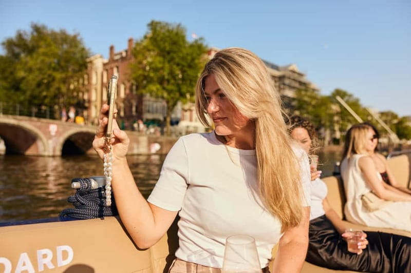Amsterdam: Spanish Guided Open Boat Cruise with Bar Onboard - Who Should Book This Cruise, and Who Might Want Something Else