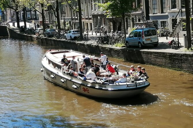 Amsterdam: The Bulldog Boat Smoke-Friendly Cruise & 2 Drinks - The boat and weather reality: half open means plan for cold