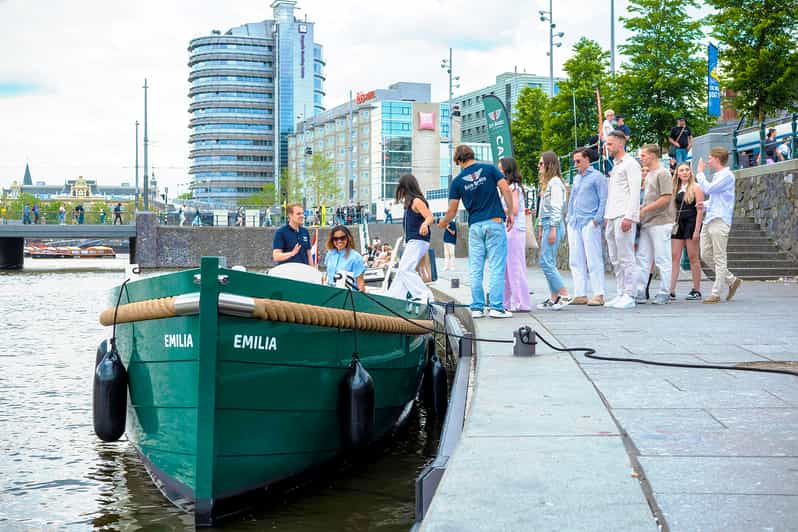 Amsterdam: The Newest Canal Cruise with Drink Option - Electric Eco Boats comfort: small group, covered options, and how it affects your photos