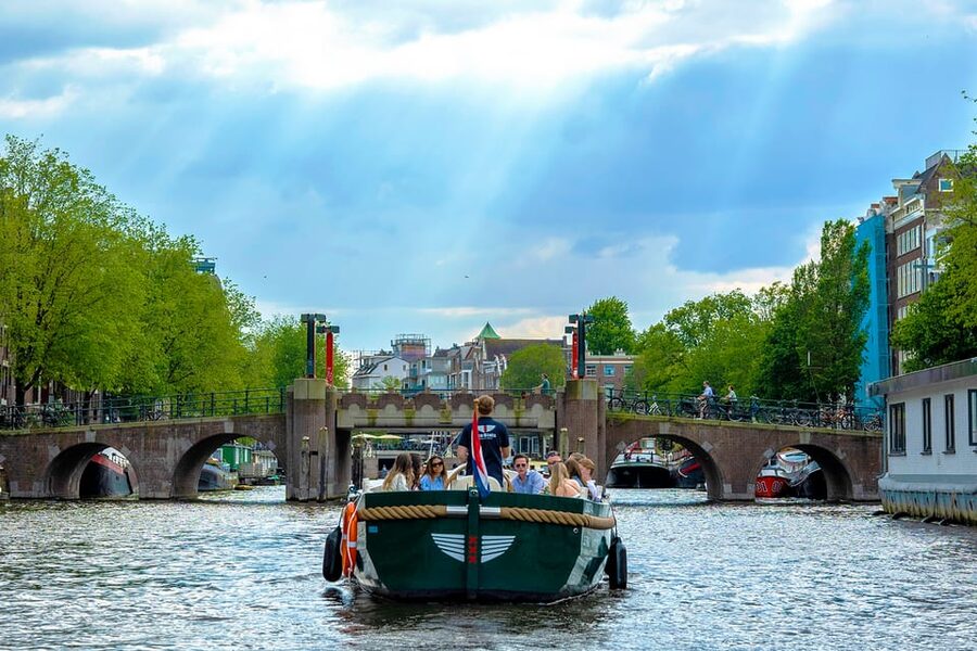 Amsterdam: The Newest Canal Cruise with Drink Option - Weather and routing reality: what to pack and what to expect
