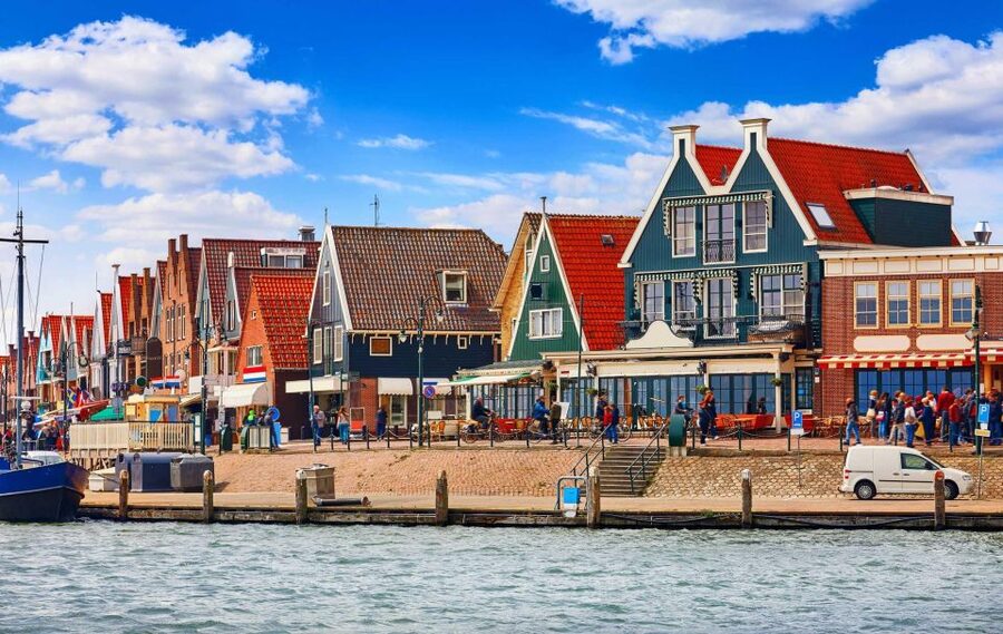 Amsterdam to Zaanse Schans Windmills, Volendam & Edam by Car - Edam’s drawbridges, cheese-market heritage, and a real farm visit