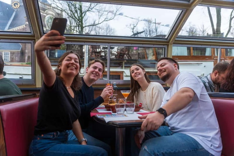 Amsterdam: Unlimited Cocktails Cruise on the Canals - Unlimited cocktails, 0.0 mocktails, and the snack table that keeps the evening easy