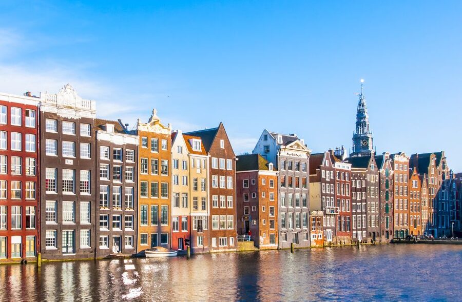 Amsterdam Walking Tour and Canal Cruise - 60-minute glass-roof canal cruise past Golden Age houses and the Stopera