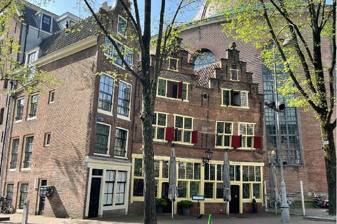 Amsterdam Walking Tour: Explore the Red Light District - Stop 1: Café the Schreiertower and the sailors’ wives story