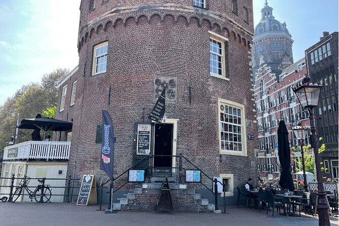 Amsterdam Walking Tour: Explore the Red Light District - Stop 2: Zeedijk, the old street line, and Chinatown’s presence