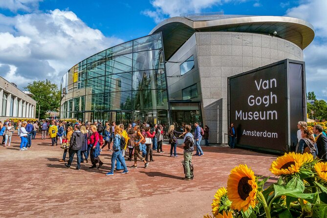 Amsterdam Walking Tour with Audioguide on Your Smartphone - Weeping Tower, Houten Huys, and the medieval-to-golden-age thread