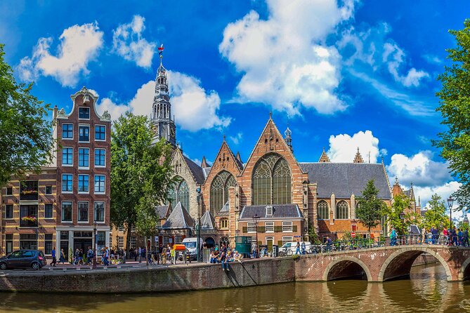 Amsterdam Walking Tour with Audioguide on Your Smartphone - De Wallen and Dam Square: what you see, and how the audio frames it
