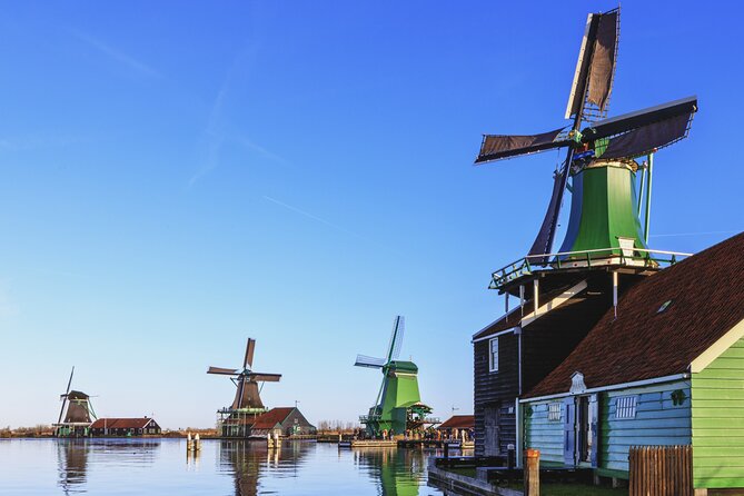 Amsterdam: Windmills, Cheese and Volendam Tour with Video Guide - Alida Hoeve cheese farm: Gouda made step by step, then tasted