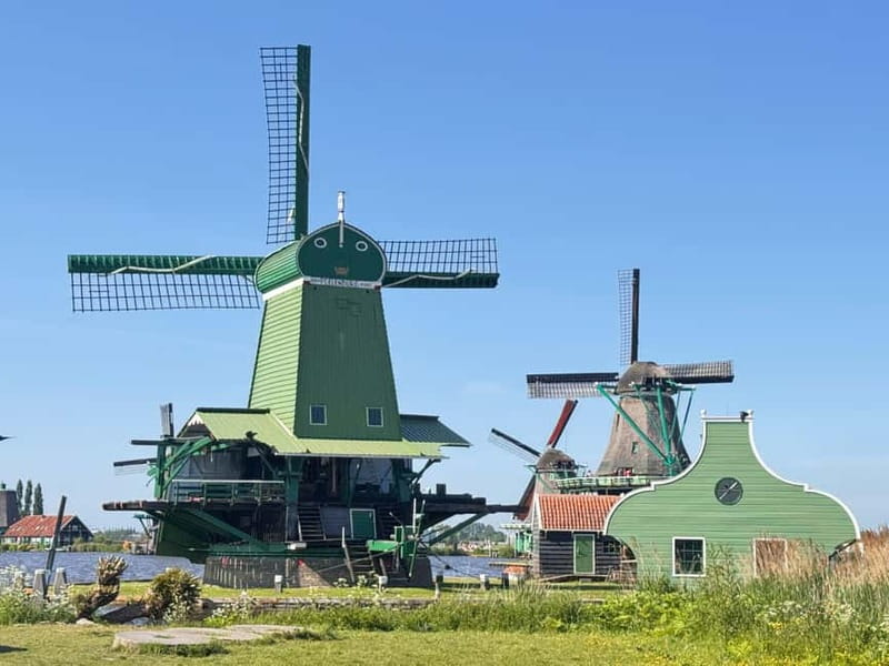 Amsterdam: Zaanse Schans Windmills & Zaandam E-Bike Tour - Zaandam and the Inntel Hotel: A Surreal Break Between Countryside Sections